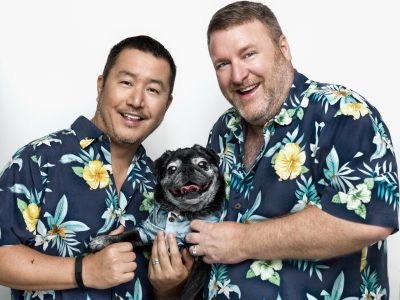 Kevin Henson on the right with his husband Toshiro to the right and their dog.